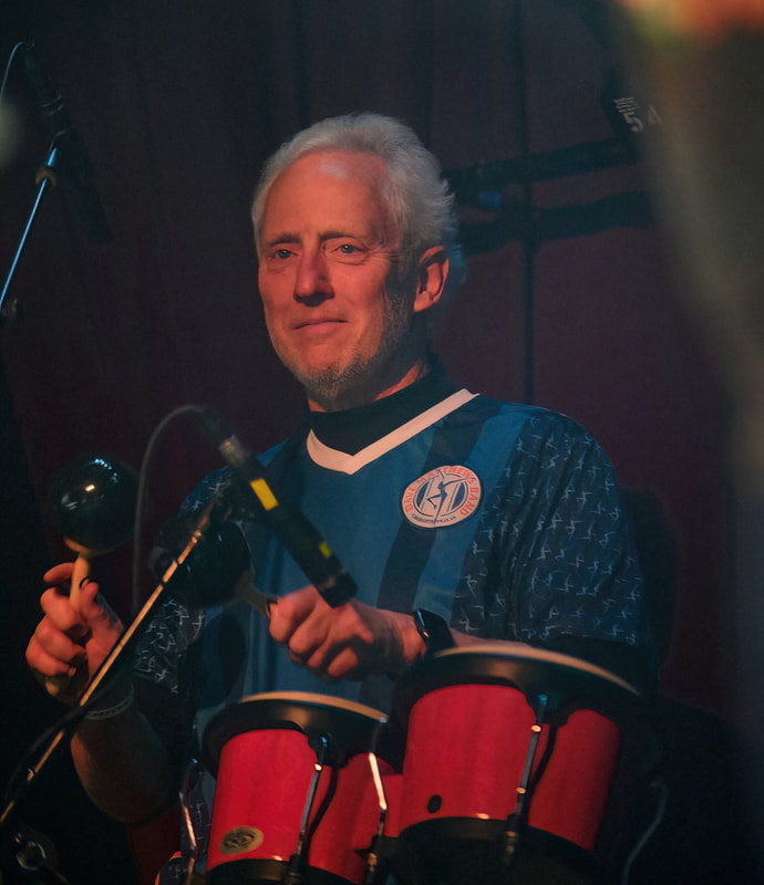 Jim Steven, M.D. (percussion)